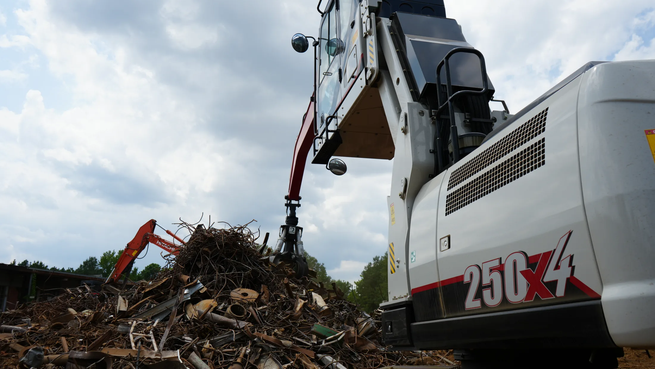 A Mims Recycling material handler working in the Ruston scrap yard